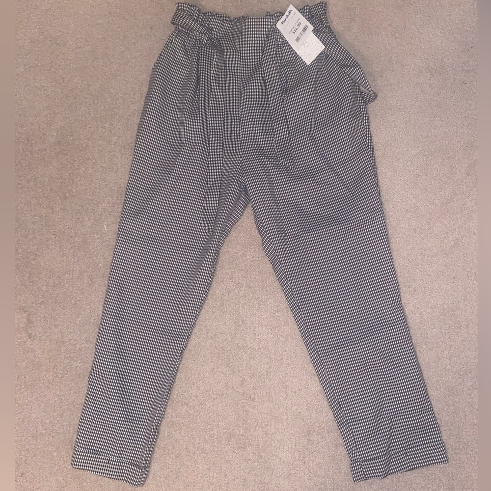 NEVER WORN: black and white plaid pants with belt.
